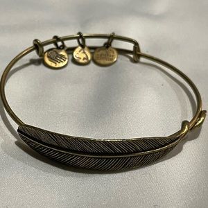 Alex and Ani gold charm bracelet
